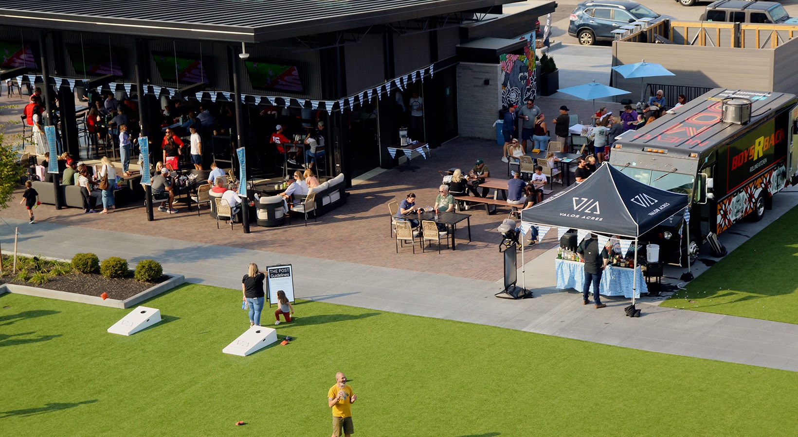 a group of people around a tent