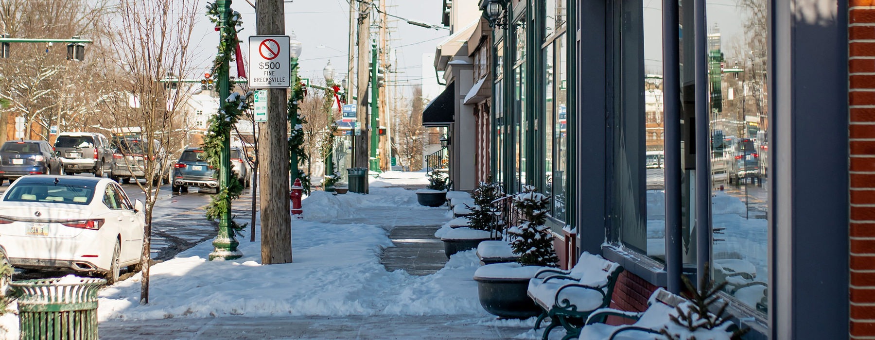 street with snow on the side walk
